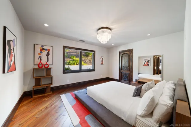 a view of a patio with table and chairs
