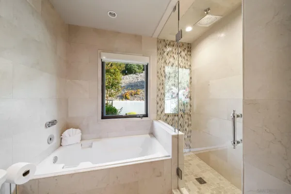 a kitchen with a sink cabinets and window