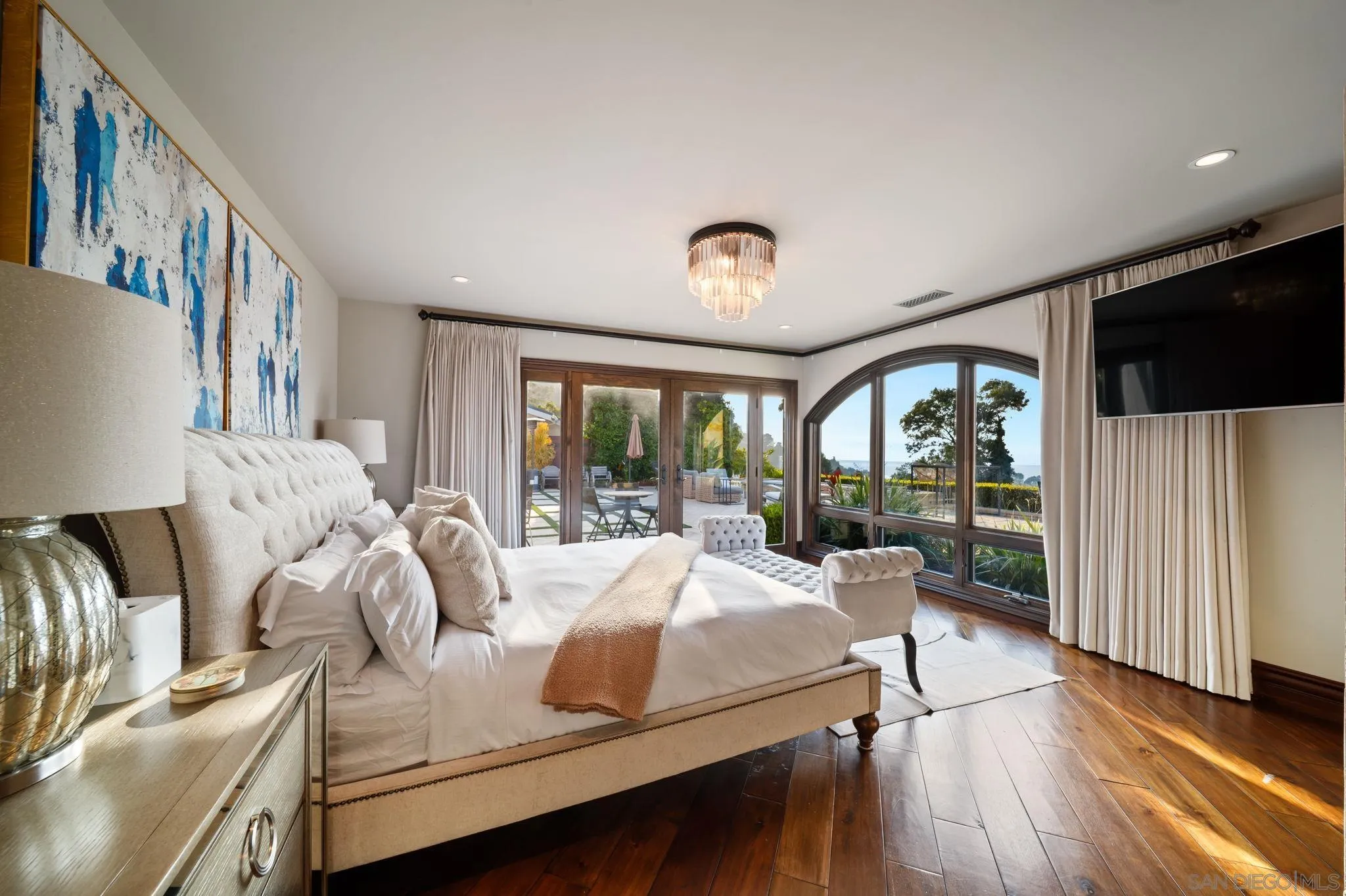 7853 Via Capri La Jolla, CA 92037 - Photo 46 of 67 a living room with furniture and a flat screen tv