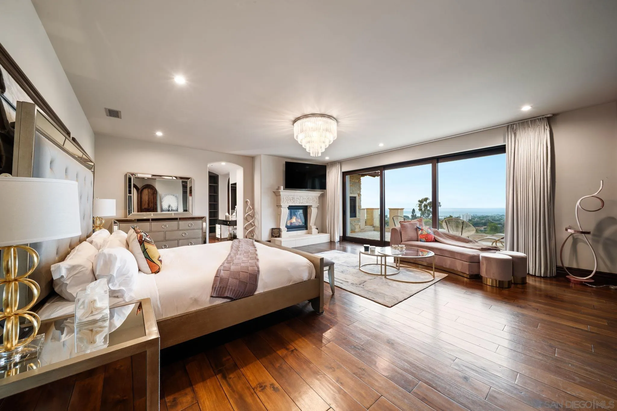 7853 Via Capri La Jolla, CA 92037 - Photo 59 of 67 a bedroom with furniture and a large window