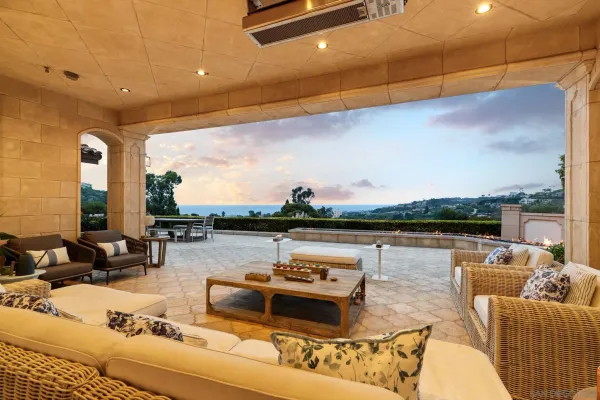a living room with fireplace furniture and a flat screen tv