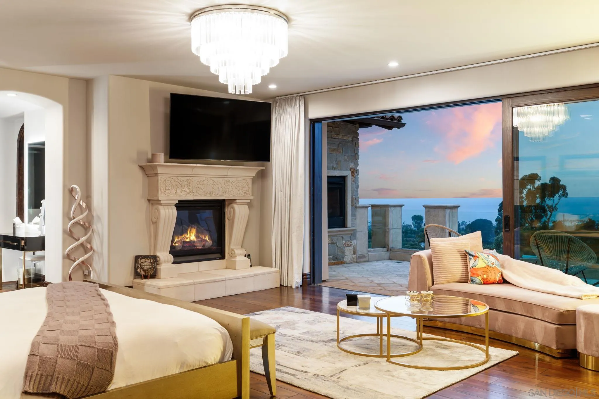 7853 Via Capri La Jolla, CA 92037 - Photo 10 of 67 a living room with fireplace furniture and a flat screen tv