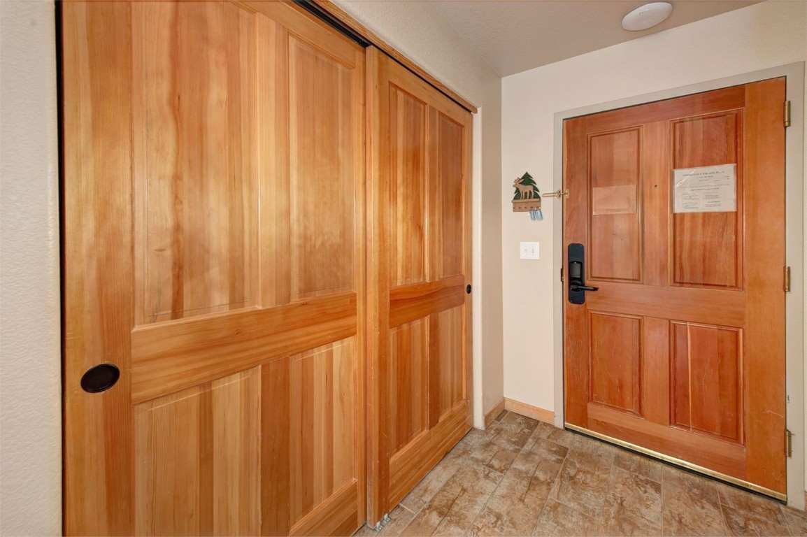 23110 Highway 6, Unit 5062 Keystone, CO 80435 - Photo 13 of 37 a view of a entryway with wooden walls