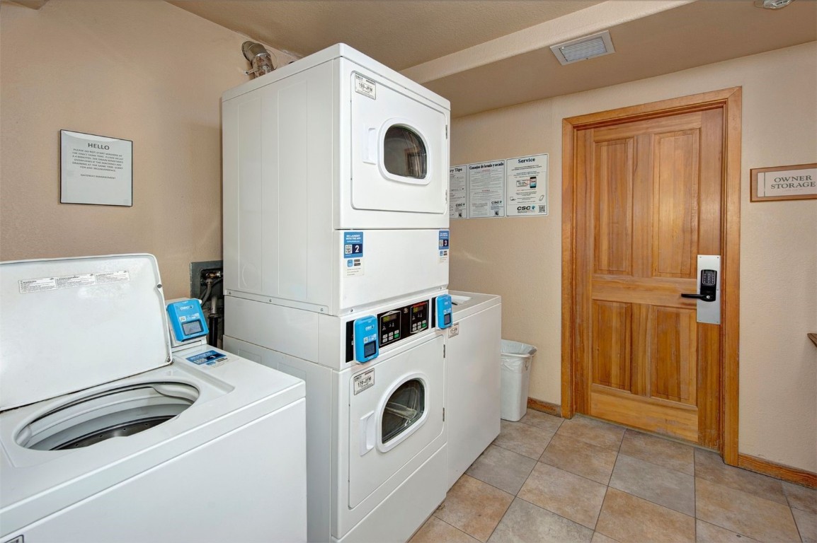 23110 Highway 6, Unit 5062 Keystone, CO 80435 - Photo 19 of 37 a utility room with dryer and washer