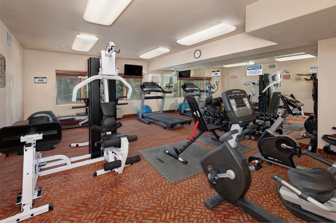 23110 Highway 6, Unit 5062 Keystone, CO 80435 - Photo 20 of 37 a view of a room with gym equipment
