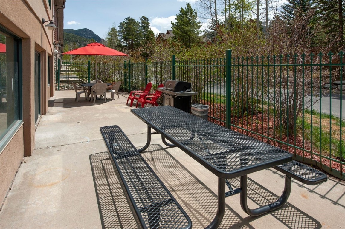 23110 Highway 6, Unit 5062 Keystone, CO 80435 - Photo 23 of 37 a view of a patio with iron fence