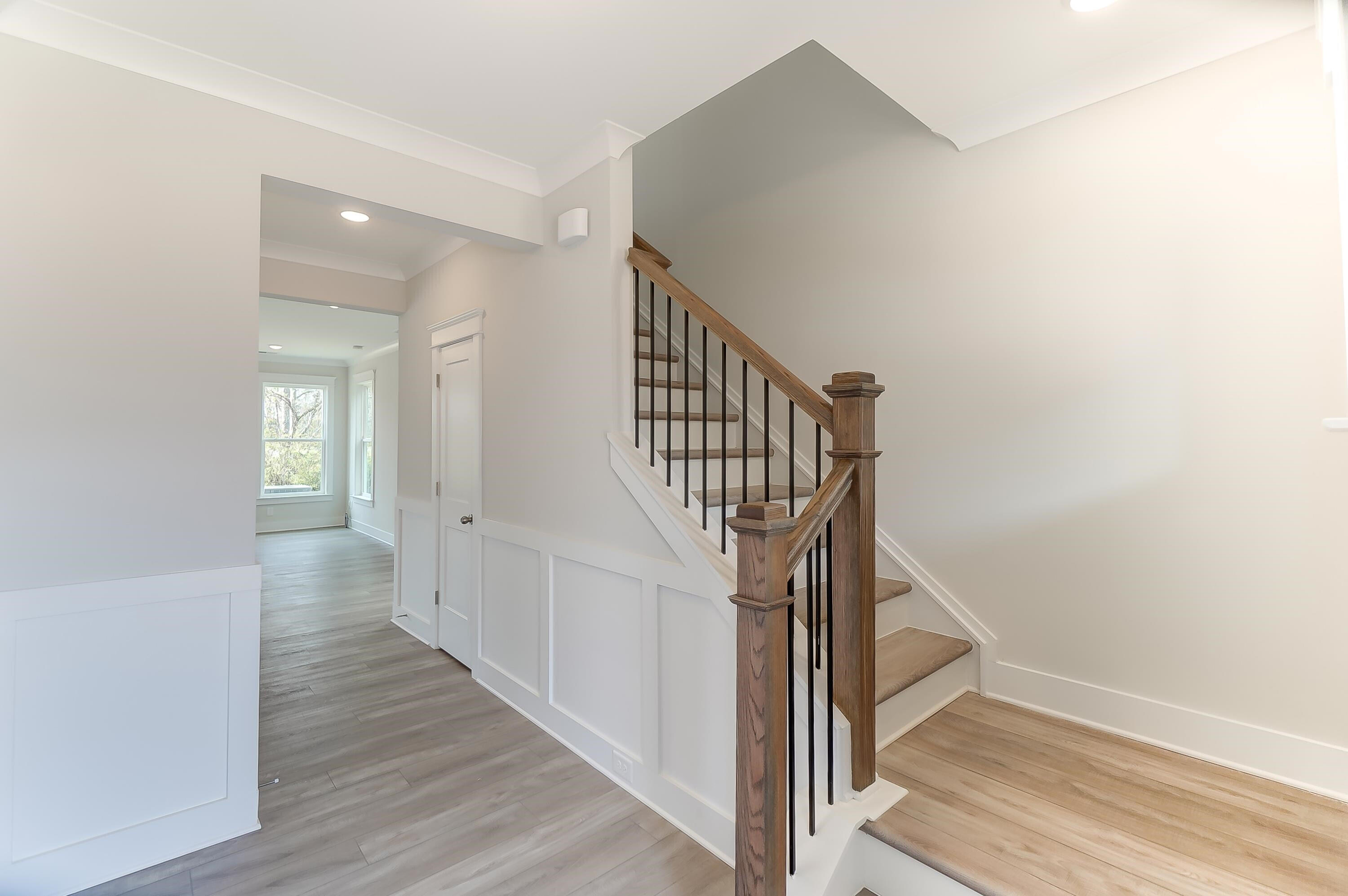 2109 Seneca Road Raleigh, NC 27604 - Photo 5 of 44 a view of a hallway with wooden floor and entryway