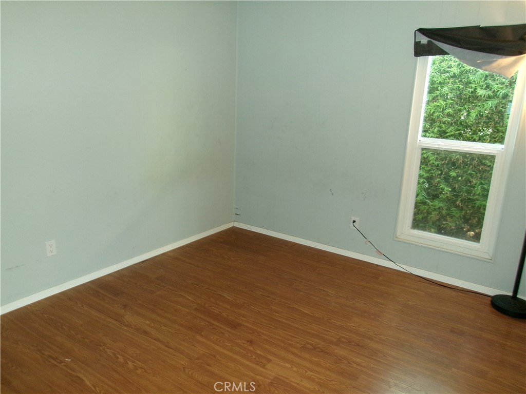 4044 Cherry Hill Road Santa Maria, CA 93455 - Photo 11 of 13 an empty room with a window