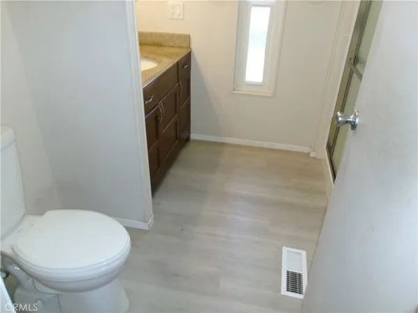 a bathroom with a sink and a shower curtain