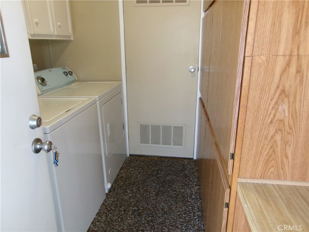 4044 Cherry Hill Road Santa Maria, CA 93455 - Photo 9 of 13 a bathroom with a sink and a shower curtain