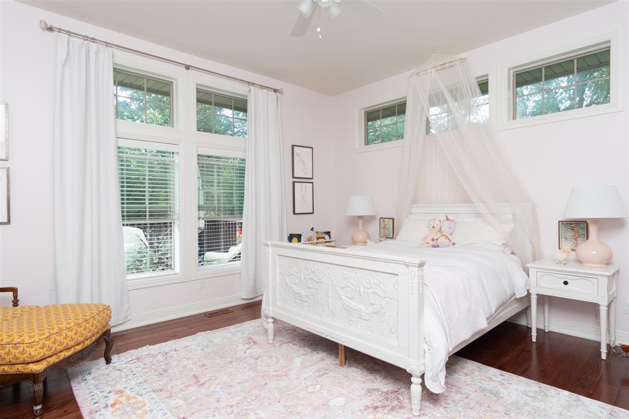 8745 Burr Oak Road Roscoe, IL 61073 - Photo 12 of 20 a bedroom with a bed and a window