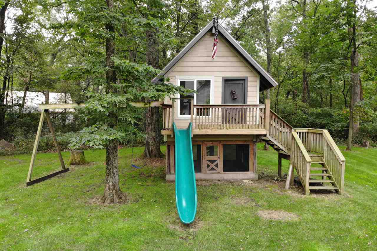 8745 Burr Oak Road Roscoe, IL 61073 - Photo 18 of 20 a view of a house with a yard