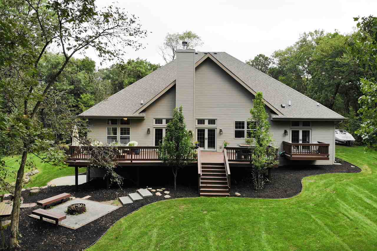 8745 Burr Oak Road Roscoe, IL 61073 - Photo 20 of 20 a view of a house with a yard porch and sitting area