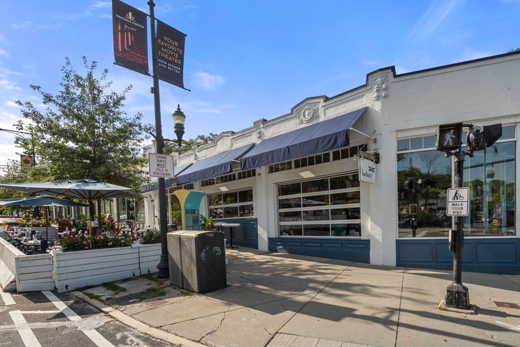 500 Washington Street, Unit 2 Brookline, MA 02445 - Photo 22 of 23 a view of a patio with table and chairs
