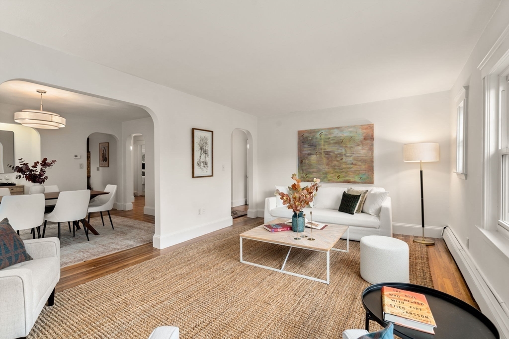 500 Washington Street, Unit 2 Brookline, MA 02445 - Photo 3 of 23 a living room with furniture and a wooden floor