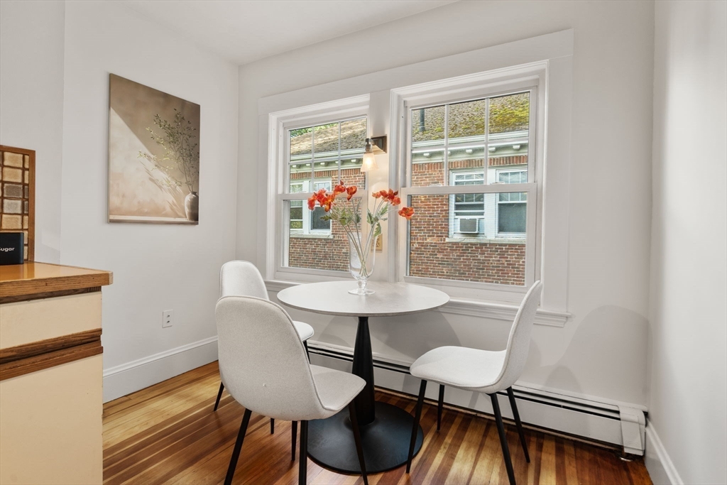 500 Washington Street, Unit 2 Brookline, MA 02445 - Photo 10 of 23 a view of a dining room with furniture window and outside view