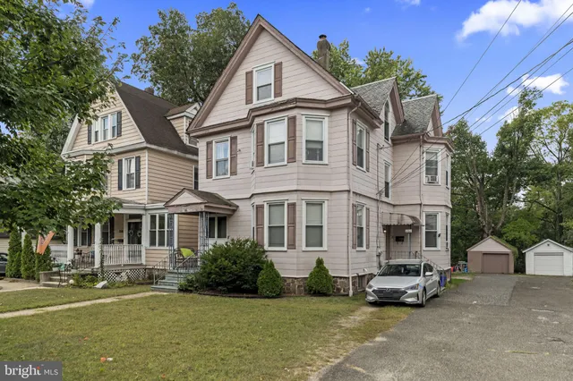a view of multiple house with a patio