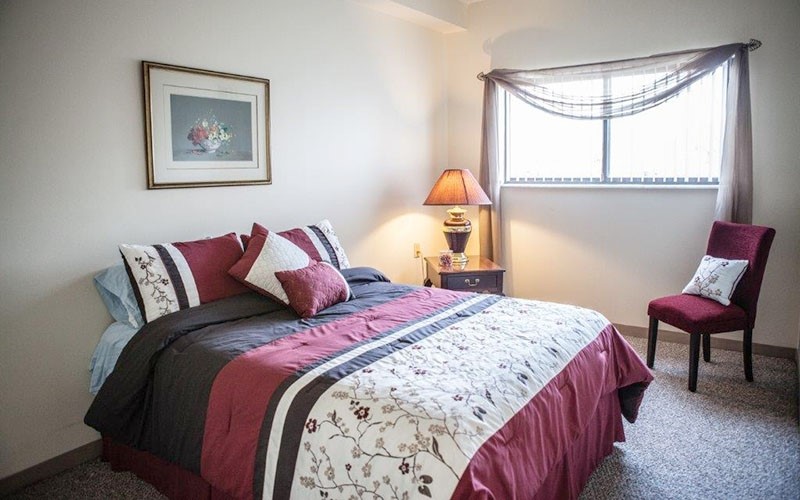 920 John R Road Troy, MI 48083 - Photo 12 of 12 a bedroom with a bed and a window