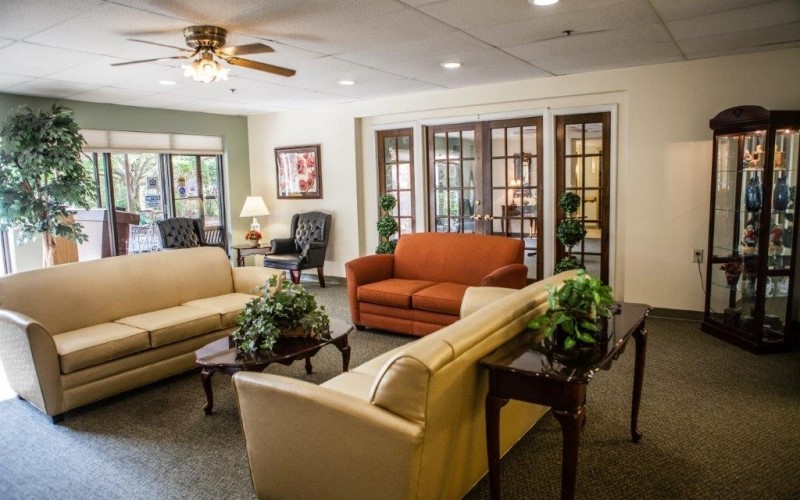 920 John R Road Troy, MI 48083 - Photo 7 of 12 a living room with furniture and a window