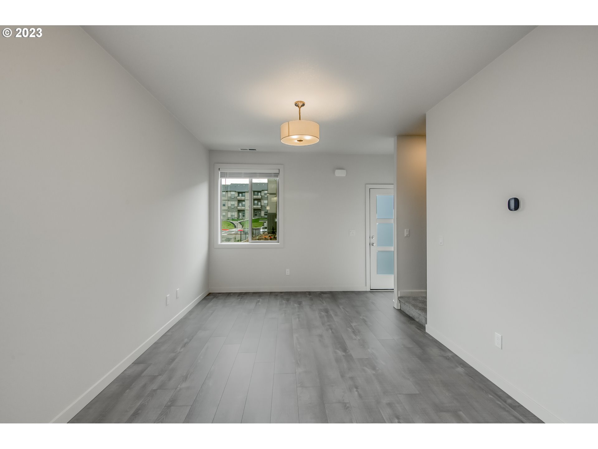 2045 Strong Road Southeast Salem, OR 97302 - Photo 3 of 10 a view of an empty room and a window