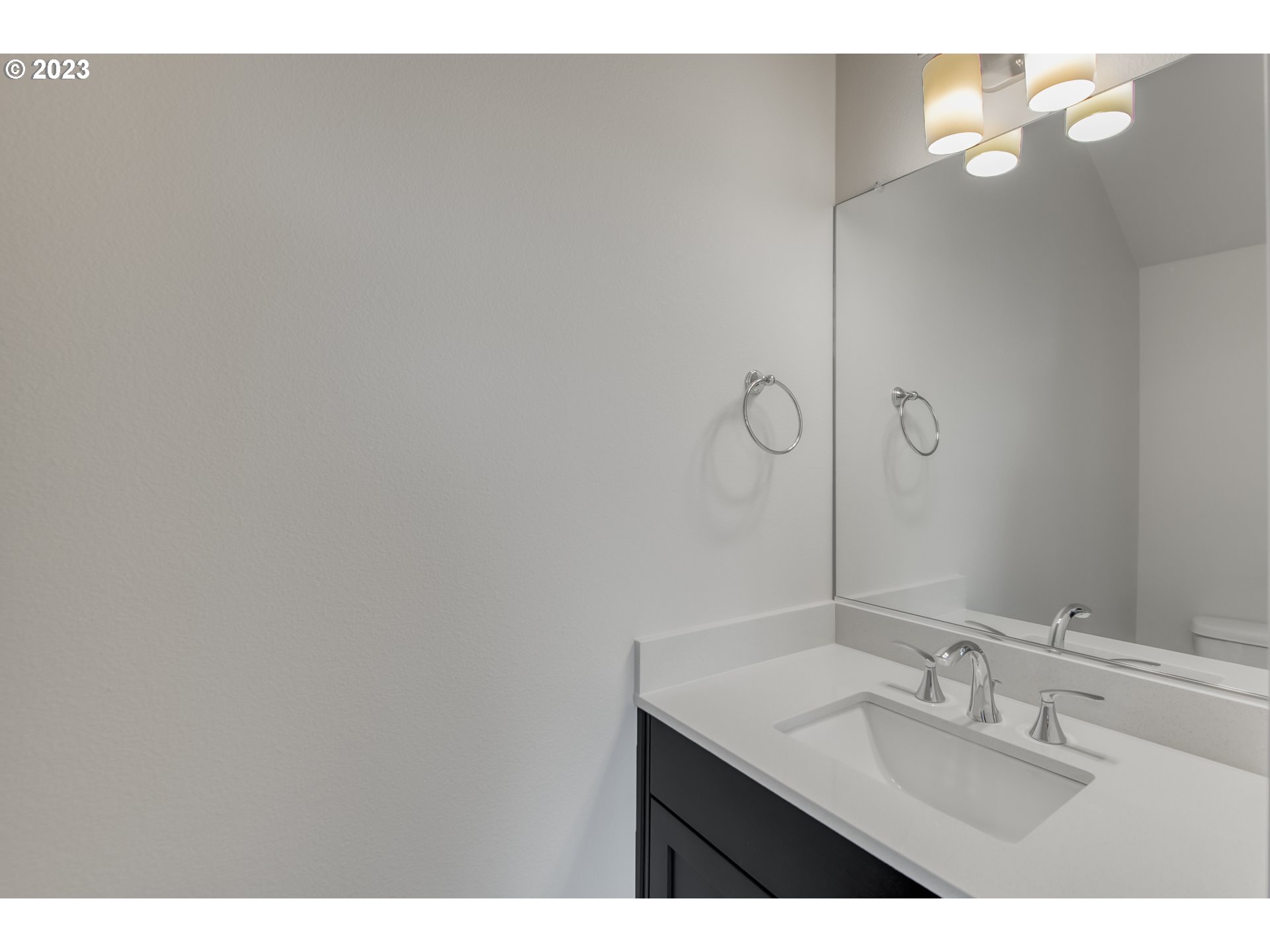 2045 Strong Road Southeast Salem, OR 97302 - Photo 4 of 10 a bathroom with a sink and mirror