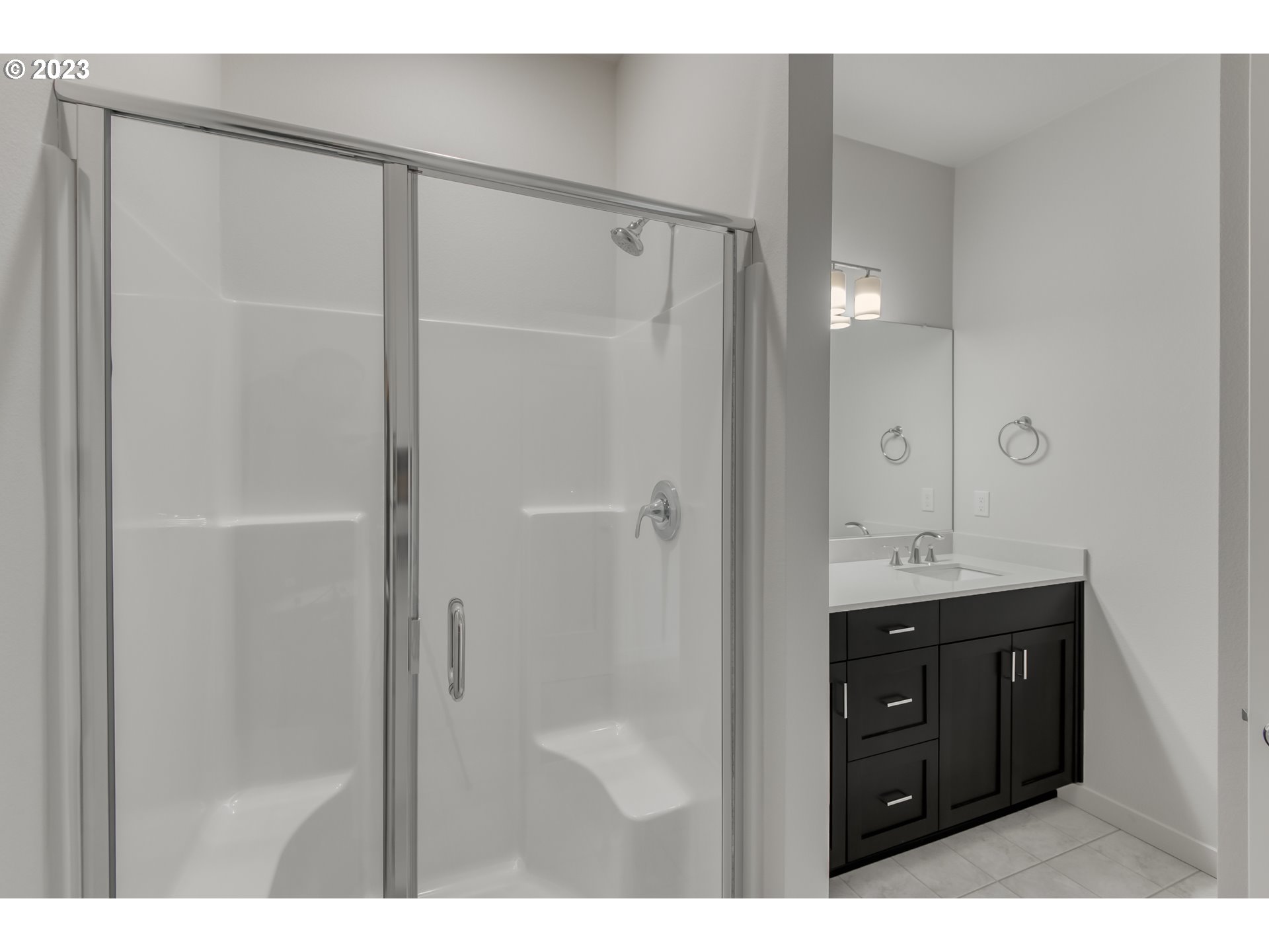 2045 Strong Road Southeast Salem, OR 97302 - Photo 9 of 10 a bathroom with a shower and a sink