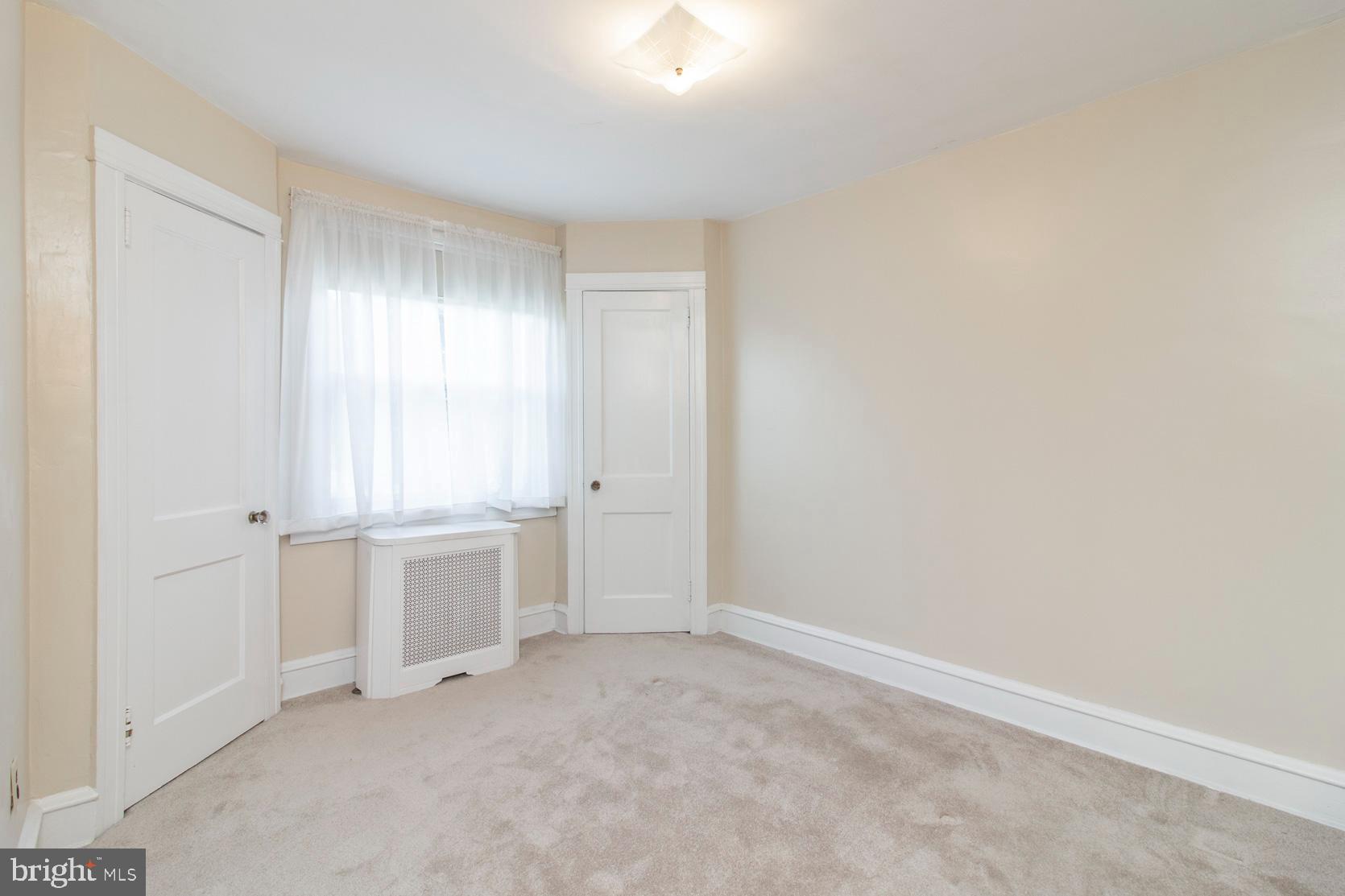 124 Woodbine Road Havertown, PA 19083 - Photo 22 of 26 an empty room with windows