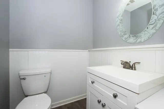 a bathroom with a toilet and a sink