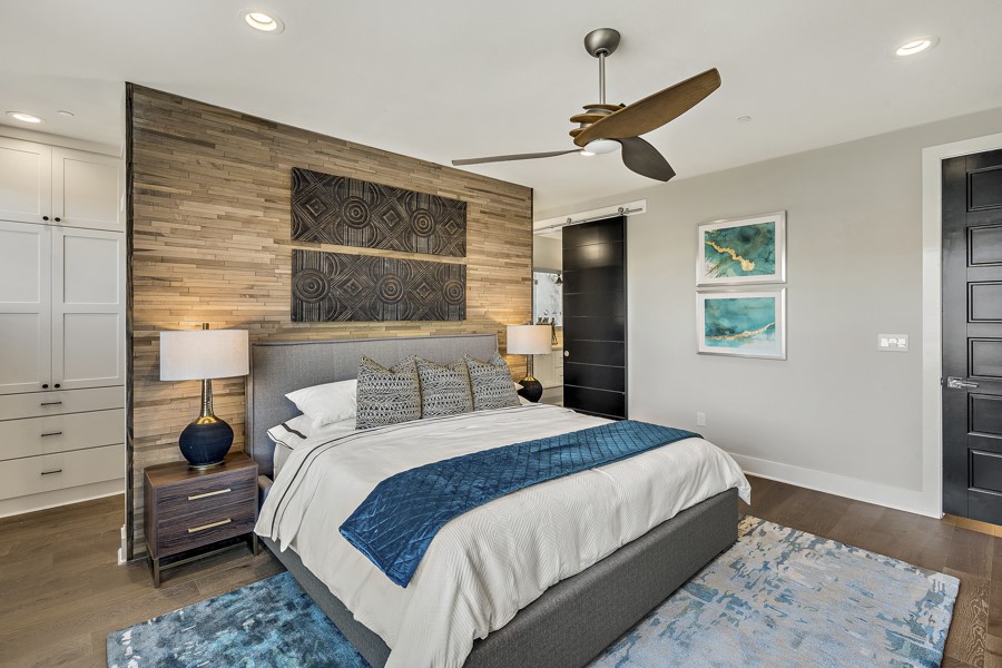 4206 Endurance Way Austin, TX 78731 - Photo 16 of 28 a bedroom with a bed and a window