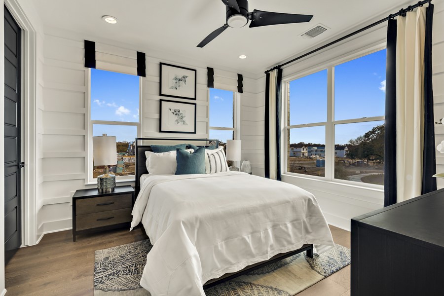 4206 Endurance Way Austin, TX 78731 - Photo 21 of 28 a bedroom with a large bed and a large window