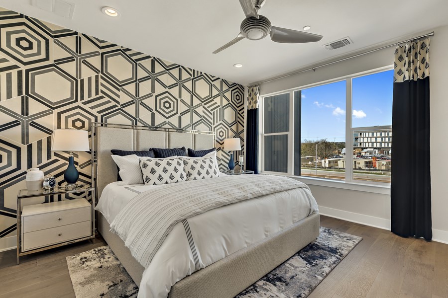 4206 Endurance Way Austin, TX 78731 - Photo 26 of 28 a bedroom with a large bed and a window