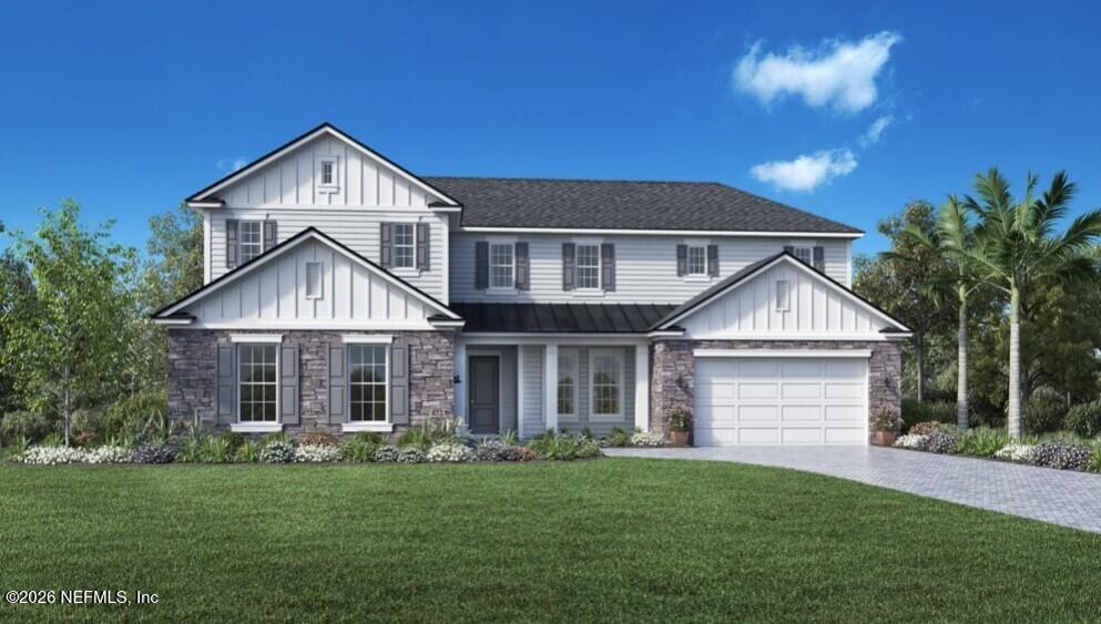 front view of a house with a yard