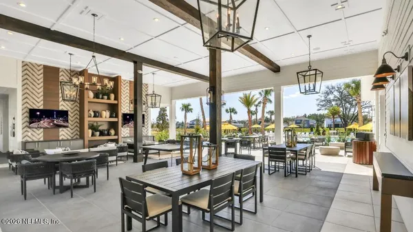 a outdoor space with lots of tables and chairs