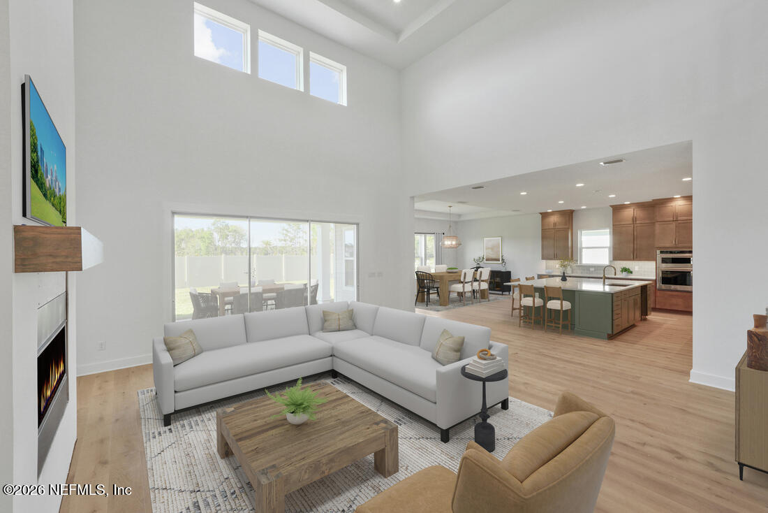 135 Sapling Terrace St. Johns, FL 32259 - Photo 4 of 17 a living room with furniture and a view of kitchen