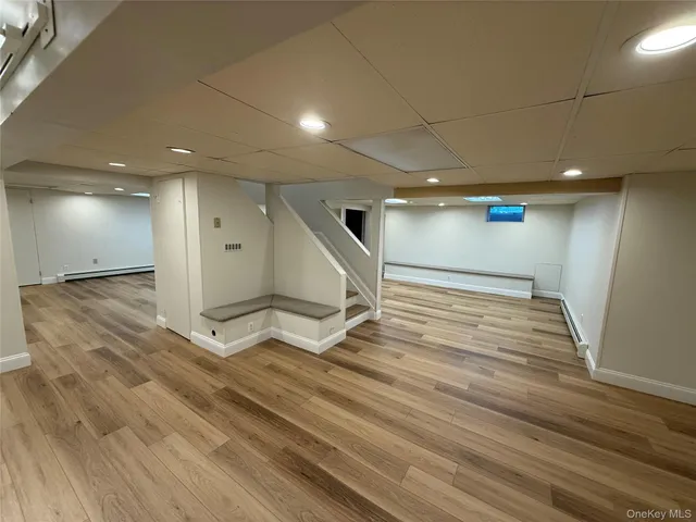 a kitchen with refrigerator and microwave