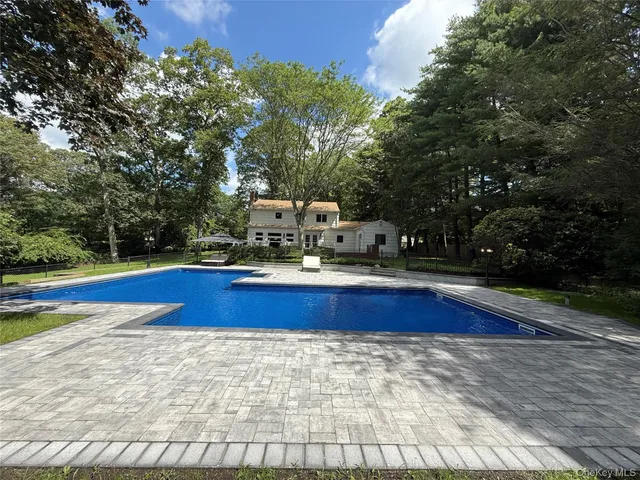 a picture of a book and a bed