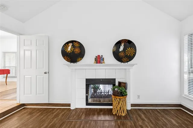 a view of a livingroom with furniture and wooden floor