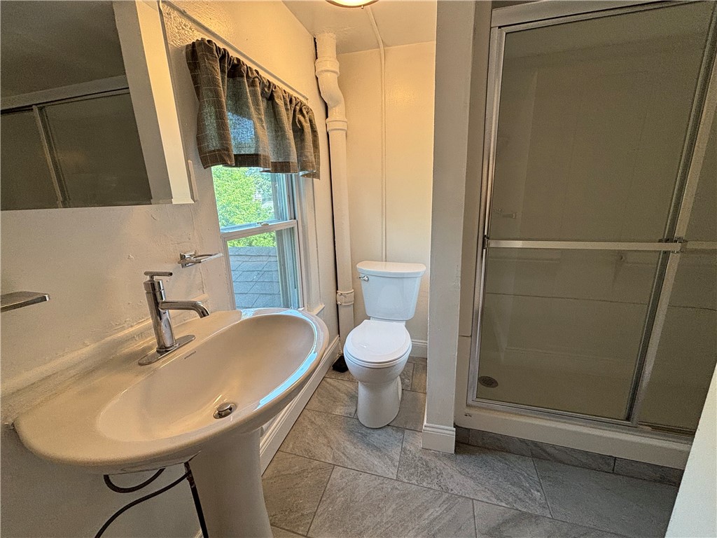 Undisclosed Address Rochester, NY 14608 - Photo 10 of 12 Bathroom