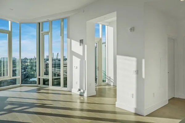 a bathroom with a sink and a large mirror