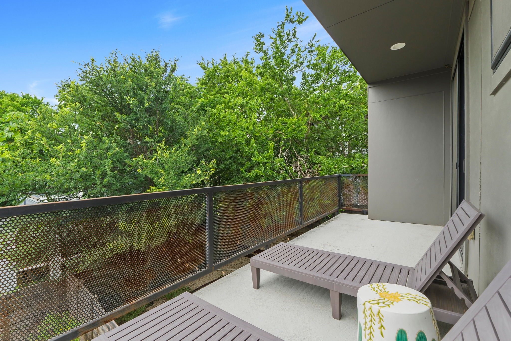 1706 Perez Street, Unit 2 Austin, TX 78721 - Photo 25 of 29 An airy private balcony offers verdant tree-top views.