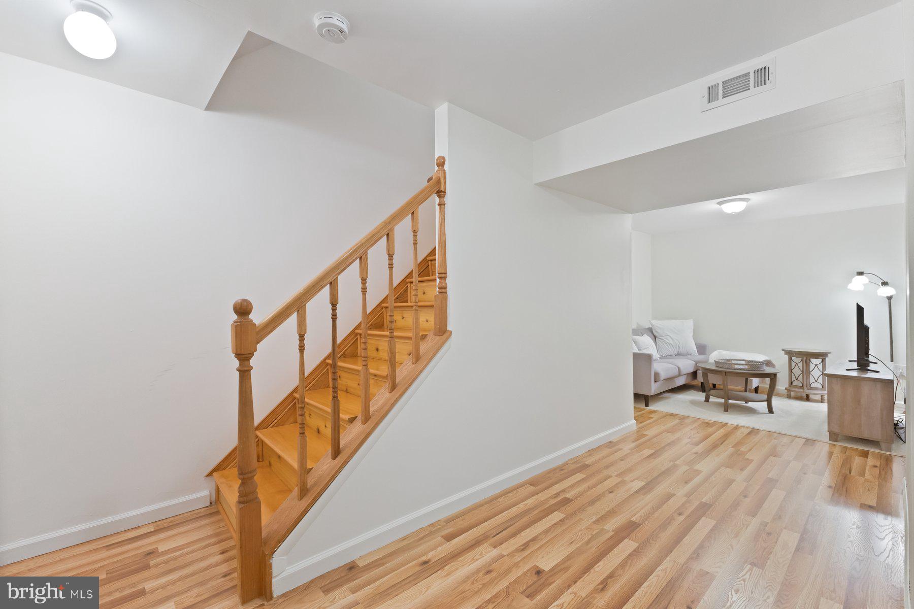 1401 Elm Grove Circle Silver Spring, MD 20905 - Photo 19 of 29 Lower basement level view of stairs