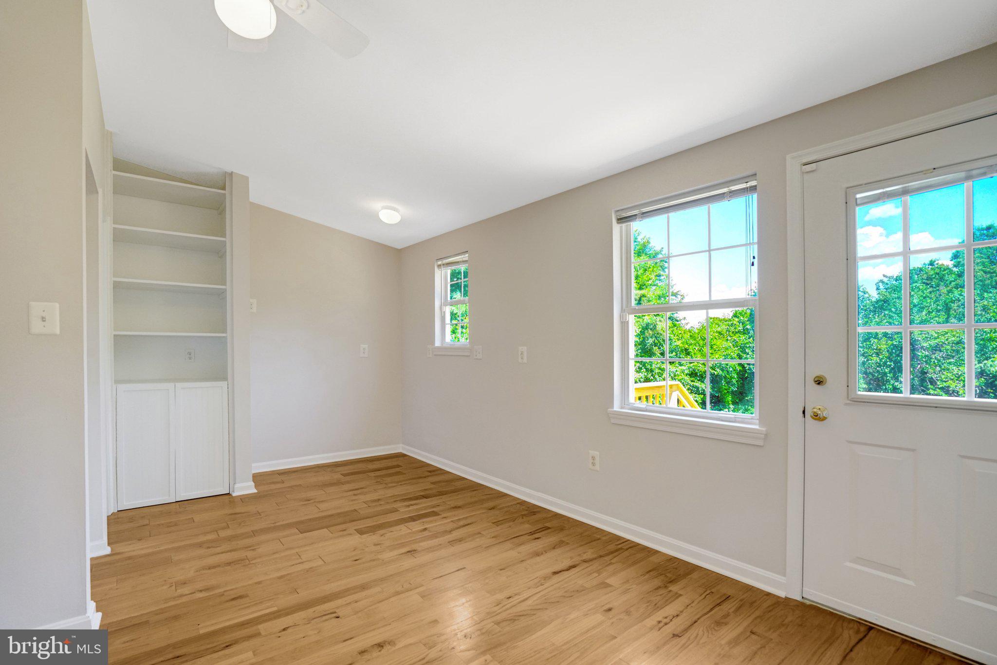 7107 Coventry Road Alexandria, VA 22306 - Photo 35 of 64 Bright bedroom with built-in shelving