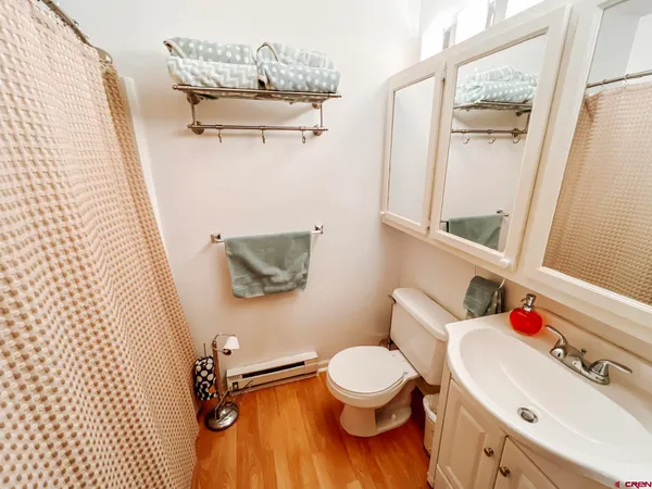 a bathroom with a sink and a toilet