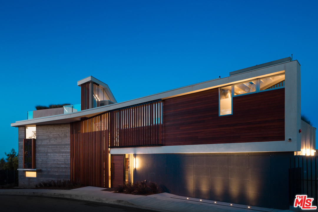 1979 Stradella Road Los Angeles, CA 90077 - Photo 1 of 38 a front view of a house