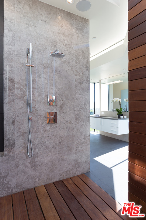 1979 Stradella Road Los Angeles, CA 90077 - Photo 20 of 38 a bathroom with a sink and a mirror