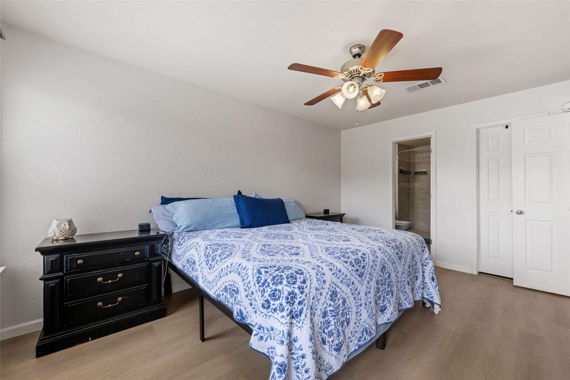 144 Calcite Lane Jarrell, TX 76537 - Photo 21 of 38 Natural illumination fills this room, complemented by a contemporary ceiling fan.
