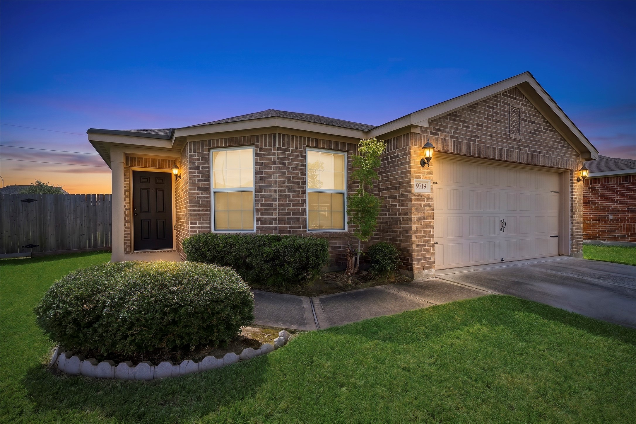 9719 Montana Sapphire Lane Rosharon, TX 77583 - Photo 1 of 40 Welcome to 9719 Montana Sapphire Lane in Rosharon. Well-maintained brick exterior showcasing the home’s curb appeal, covered entry, and welcoming front elevation.