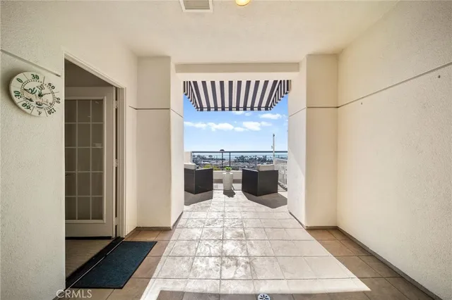 a view of a balcony with wooden floor