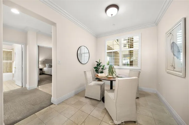a view of a livingroom with furniture and windows