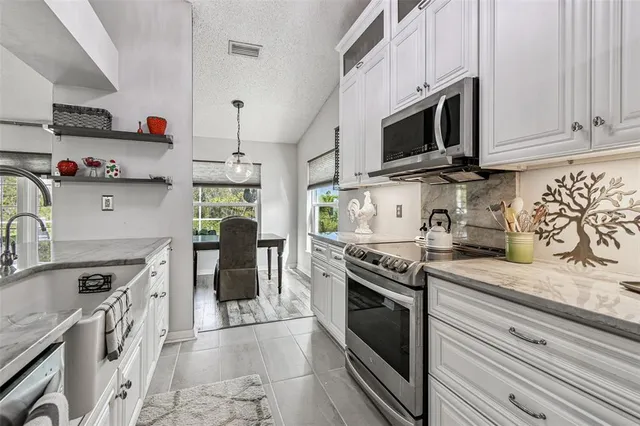 a view of a dining room with furniture